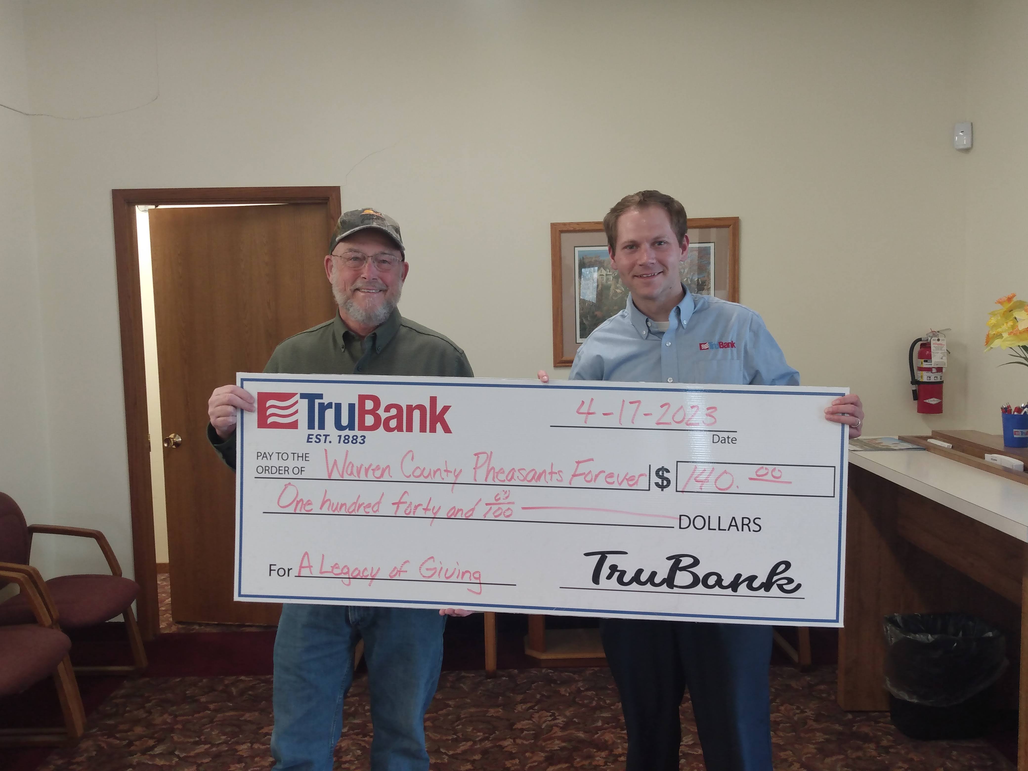 Ben Currie donates to Warren County Pheasants Forever